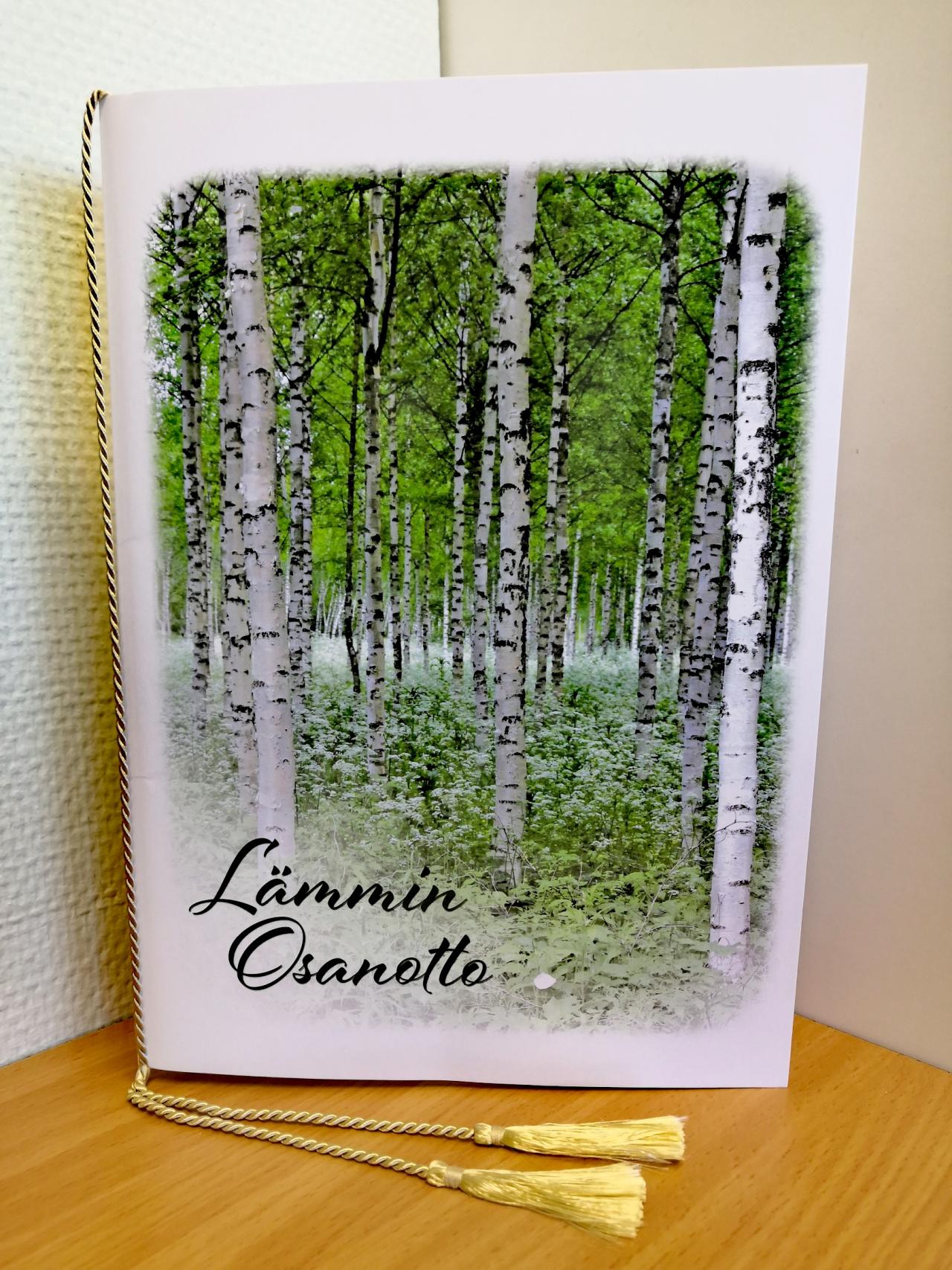 Suruadressi, jossa kesäistä koivumetsää.